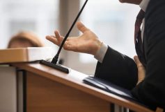 Doctor testifying TBI case
